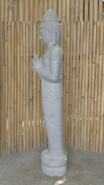 Product image 4 of the product “Standing Buddha made of Riverstone, position Namaskara , H. 185cm. There is a stone eye on the right thight. ”